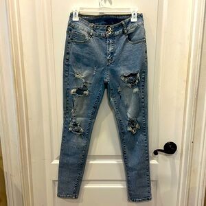 Women’s stretch distressed jeans size 4